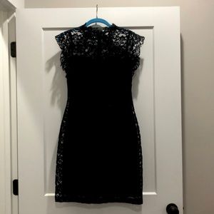 Black lace fitted dress.